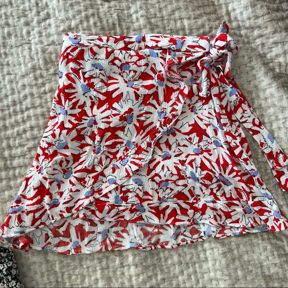 red floral skirt